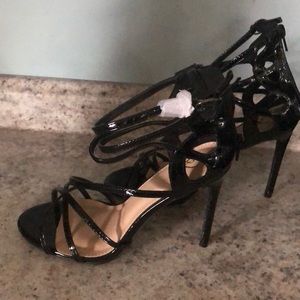 Strapped black heels